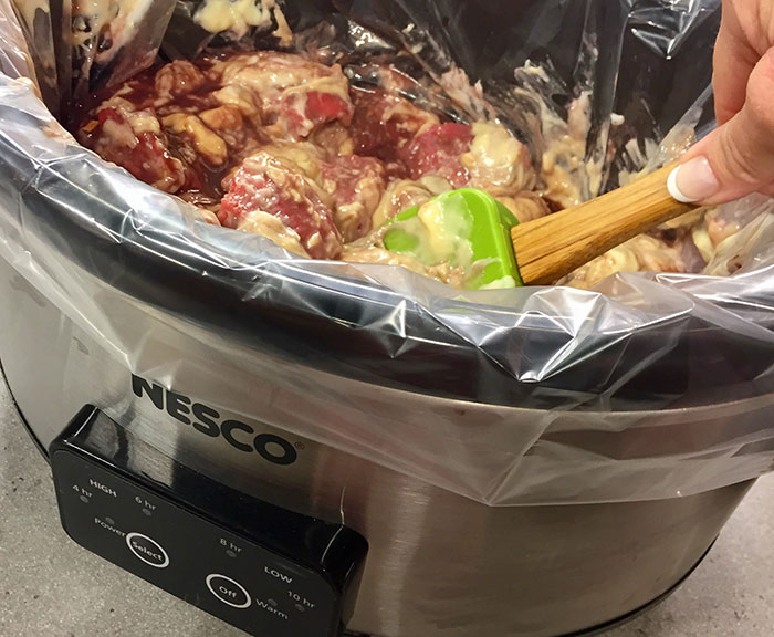 Just Leave It Beef and Wine Mixed in the Nesco Slow Cooker