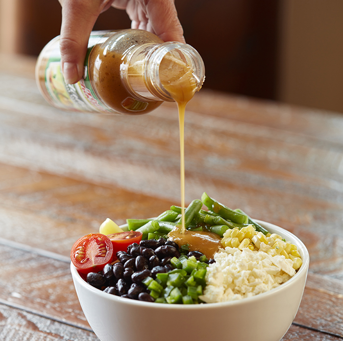 Pour Tony Chachere's Italian Dressing over Farmer's Market Salad ingredients