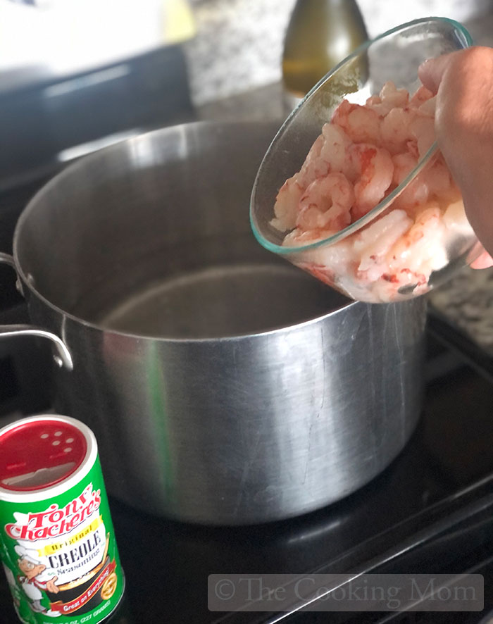 Boil shrimp in 6 cups of boiling water