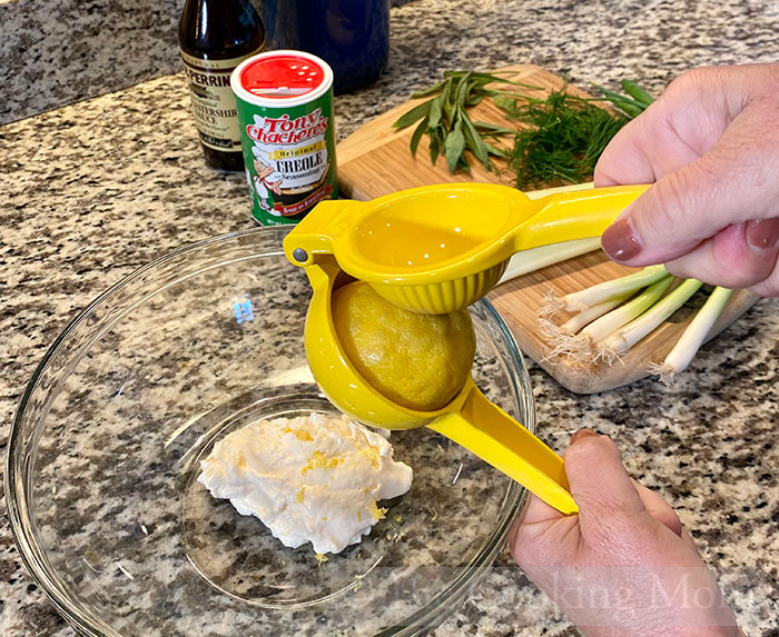 Cut lemon in half, then squeeze juice into bowl